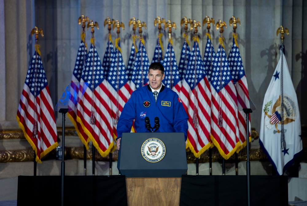 Canadian astronaut Jeremy Hansen introduces Vice President Kamala Harris at the 2023 National Space Council Meeting
