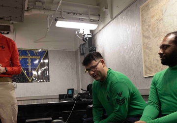 Sailors Assigned to Helicopter Sea Combat Squadron (HSC) 4 speak on the phone with the Chief of Naval Operations, Adm. Lisa Franchetti Aboard USS Carl Vinson (CVN 70)