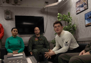 Sailors Assigned to Helicopter Sea Combat Squadron (HSC) 4 speak on the phone with the Chief of Naval Operations, Adm. Lisa Franchetti Aboard USS Carl Vinson (CVN 70)