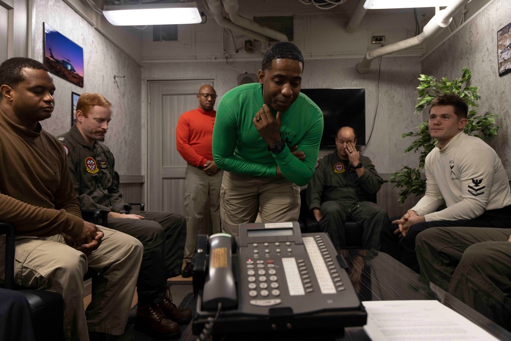 Sailors Assigned to Helicopter Sea Combat Squadron (HSC) 4 speak on the phone with the Chief of Naval Operations, Adm. Lisa Franchetti Aboard USS Carl Vinson (CVN 70)