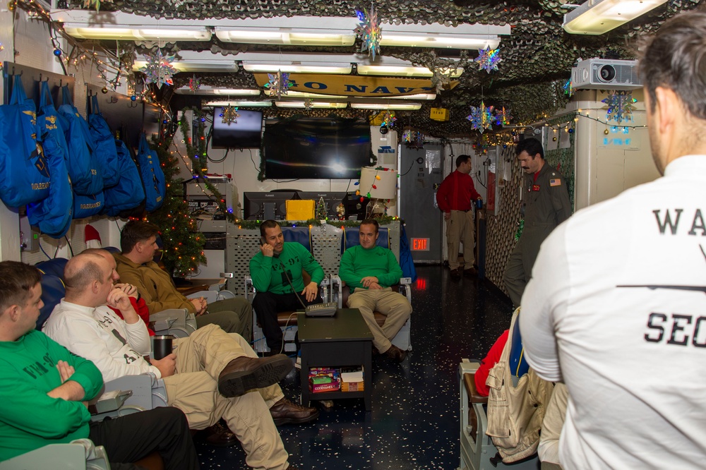 Sailors Assigned to Strike Fighter Squadron VFA (97) speak on the phone with the Vice Chief of Naval Operations, Adm. James Kilby