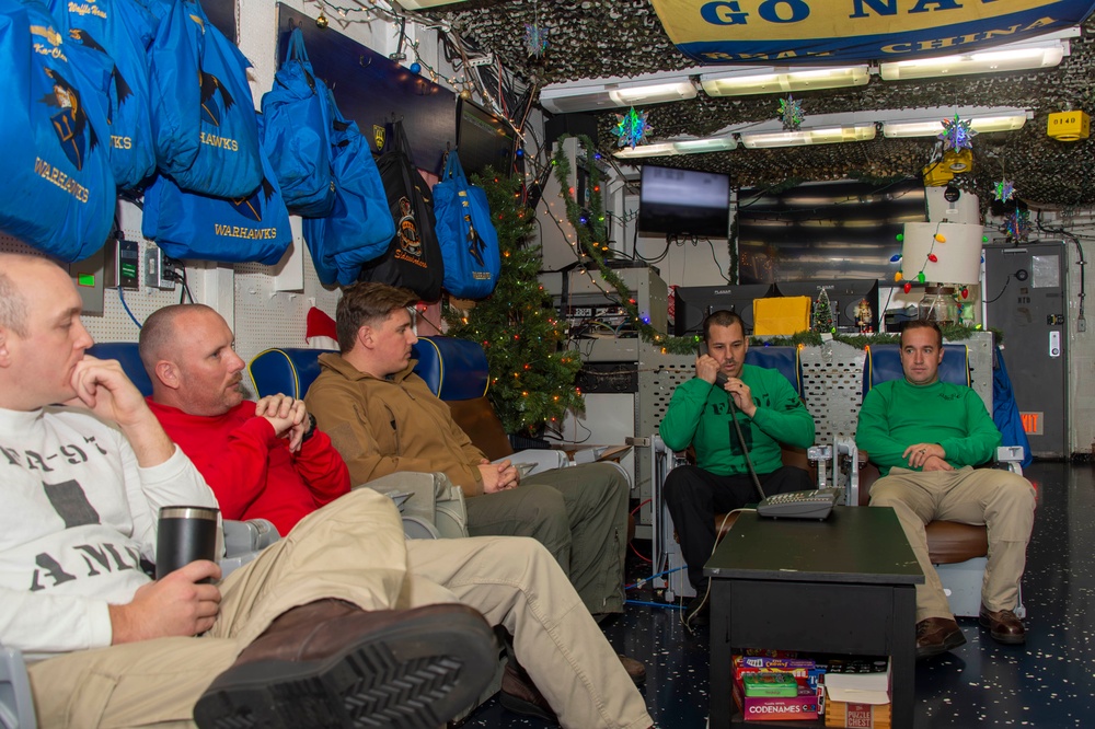 Sailors Assigned to Strike Fighter Squadron VFA (97) speak on the phone with the Vice Chief of Naval Operations, Adm. James Kilby