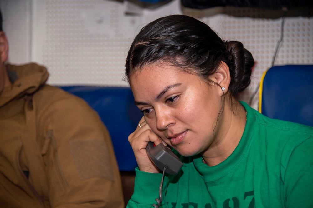 Sailors Assigned to Strike Fighter Squadron VFA (97) speak on the phone with the Vice Chief of Naval Operations, Adm. James Kilby