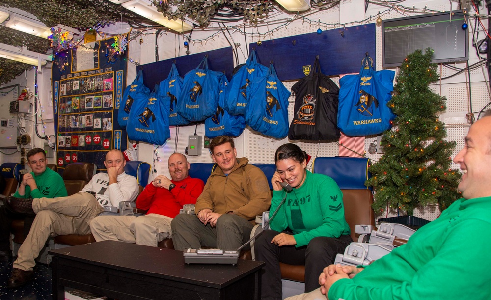 Sailors Assigned to Strike Fighter Squadron VFA (97) speak on the phone with the Vice Chief of Naval Operations, Adm. James Kilby