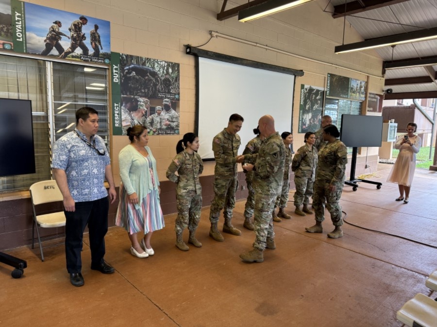 2 A team provides the 921st Command Team with a contracting support brief during one of their scenario practical exercises