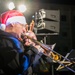 Sailors from the U.S. 7th Fleet Band participate in a Tree-Lighting Ceremony aboard Commander, Fleet Activities Yokosuka.