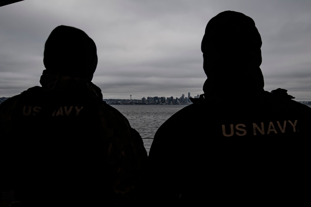 Nimitz Sailors Observe the Seattle Skyline