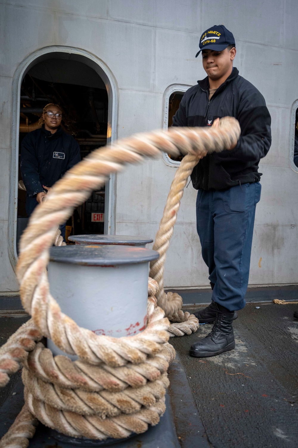 Nimitz Sailor Heaves Around Line