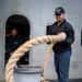 Nimitz Sailor Heaves Around Line