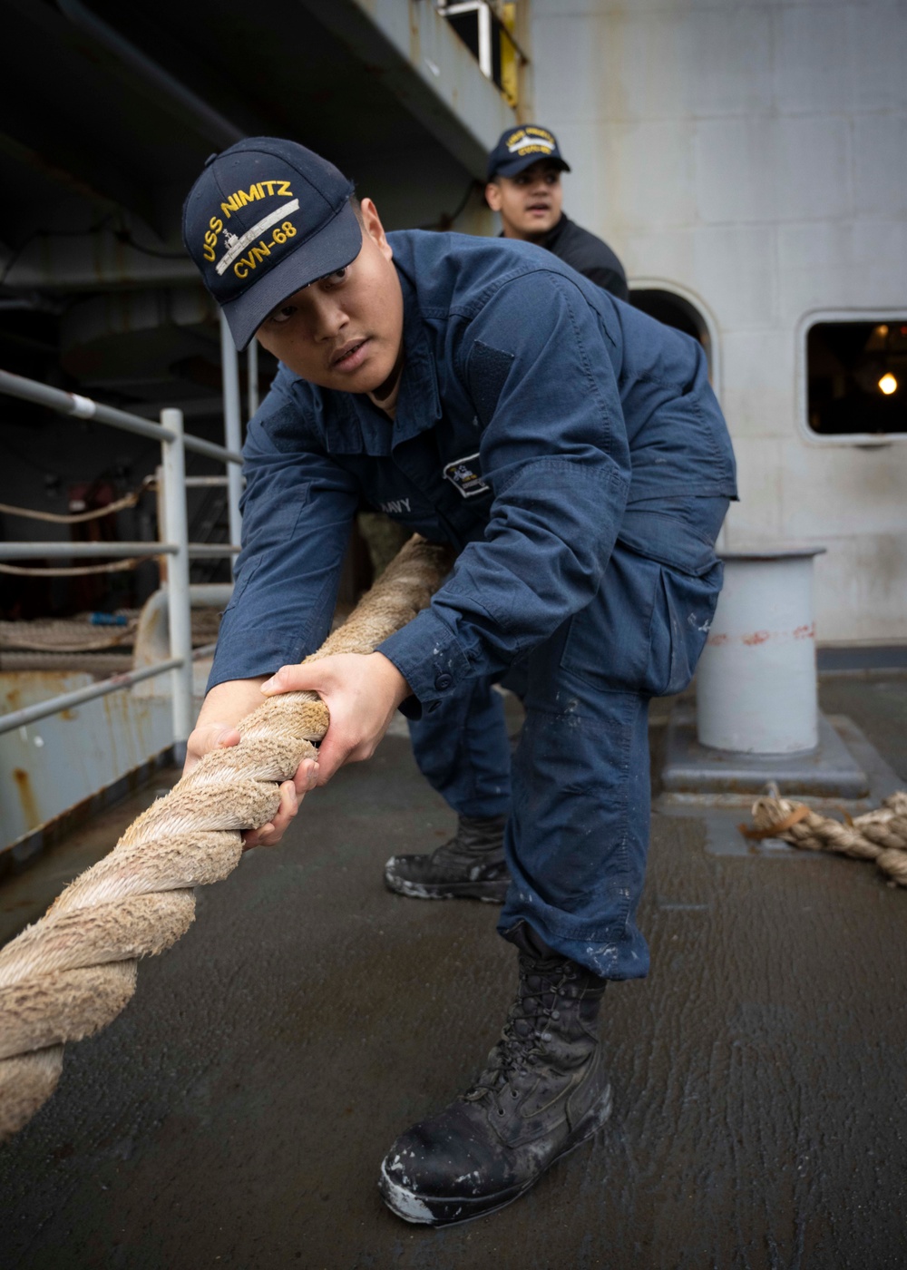 Nimitz Sailor Heaves Around Line