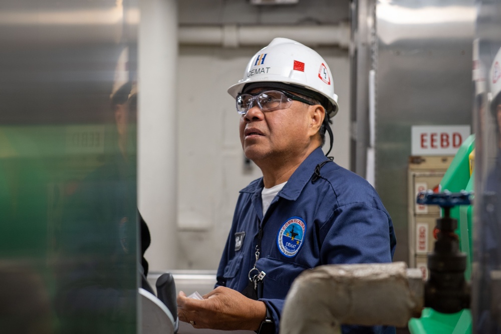 Contractors assess USS Ronald Reagan (CVN 76)