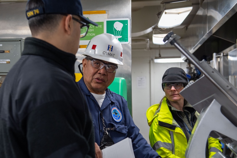 Contractors assess USS Ronald Reagan (CVN 76)