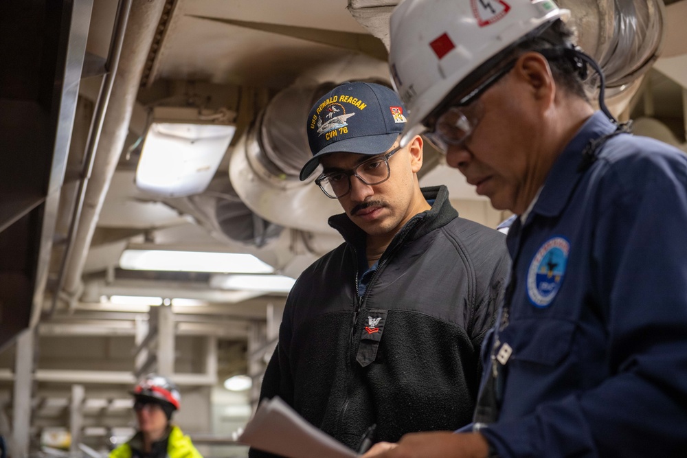 Contractors assess USS Ronald Reagan (CVN 76)