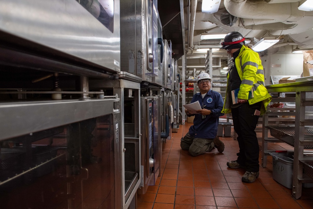 Contractors assess USS Ronald Reagan (CVN 76)