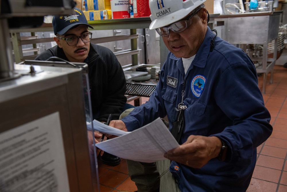 Contractors assess USS Ronald Reagan (CVN 76)