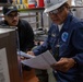 Contractors assess USS Ronald Reagan (CVN 76)