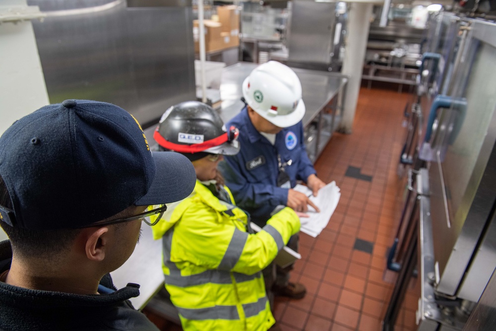 Contractors assess USS Ronald Reagan (CVN 76)