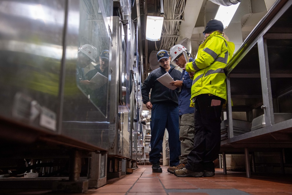 Contractors assess USS Ronald Reagan (CVN 76)