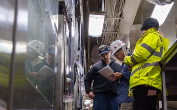 Contractors assess USS Ronald Reagan (CVN 76)