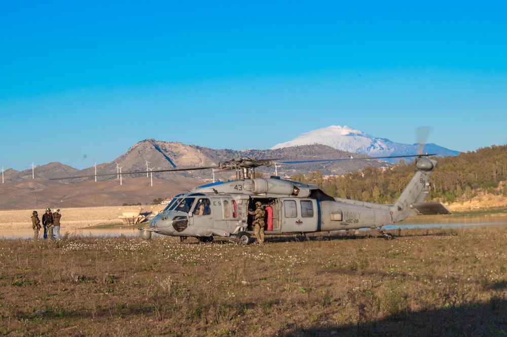 “The Dragon Whales” of HSC 28 fly above Sicily