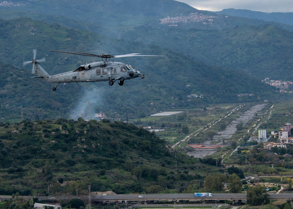 “The Dragon Whales” of HSC 28 fly above Sicily