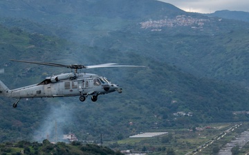 “The Dragon Whales” of HSC 28 fly above Sicily