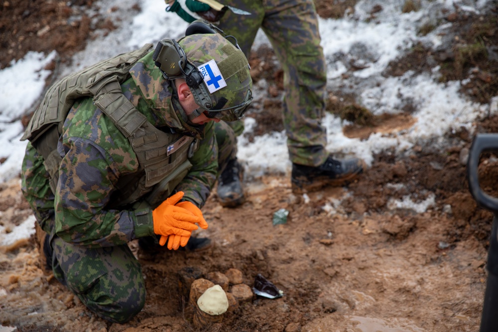 Multinational EOD soldiers assigned to NATO-led KFOR mission conduct proper disposal of unexploded ordnance