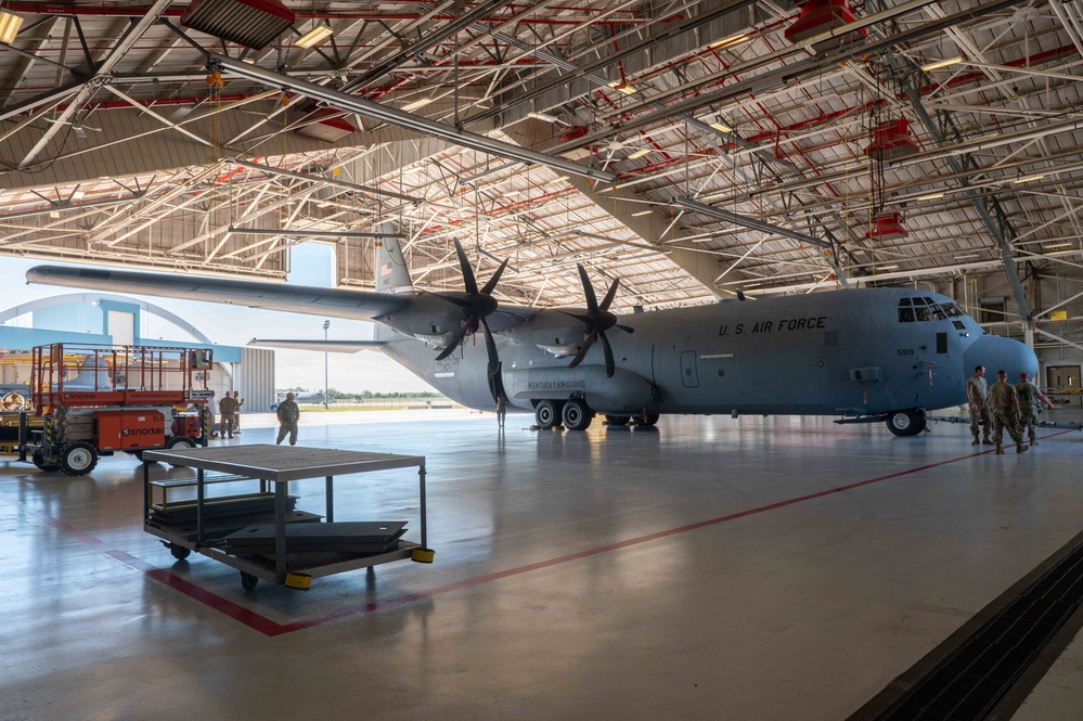 C-130J towed into hangar