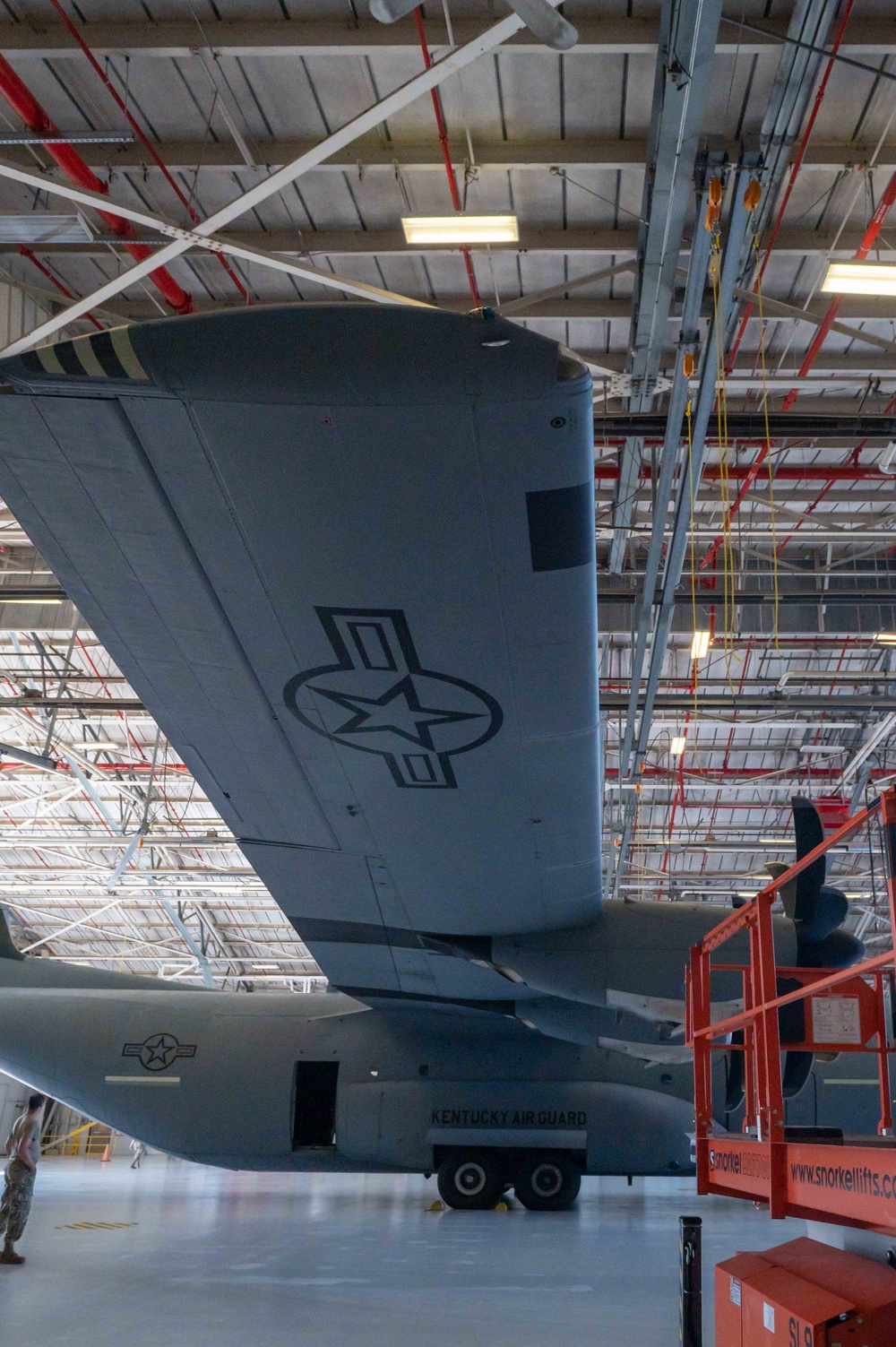 C-130J towed into hangar