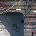 C-130J towed into hangar