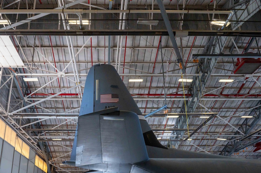 C-130J towed into hangar