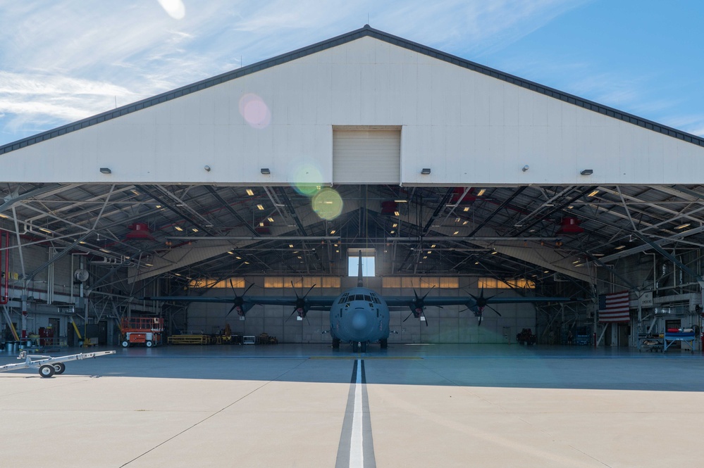 C-130J towed into hangar