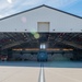 C-130J towed into hangar