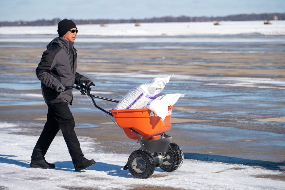 Joint Base Andrews team clears ice, snow ahead of state funeral arrival ceremony