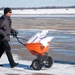 Joint Base Andrews team clears ice, snow ahead of state funeral arrival ceremony