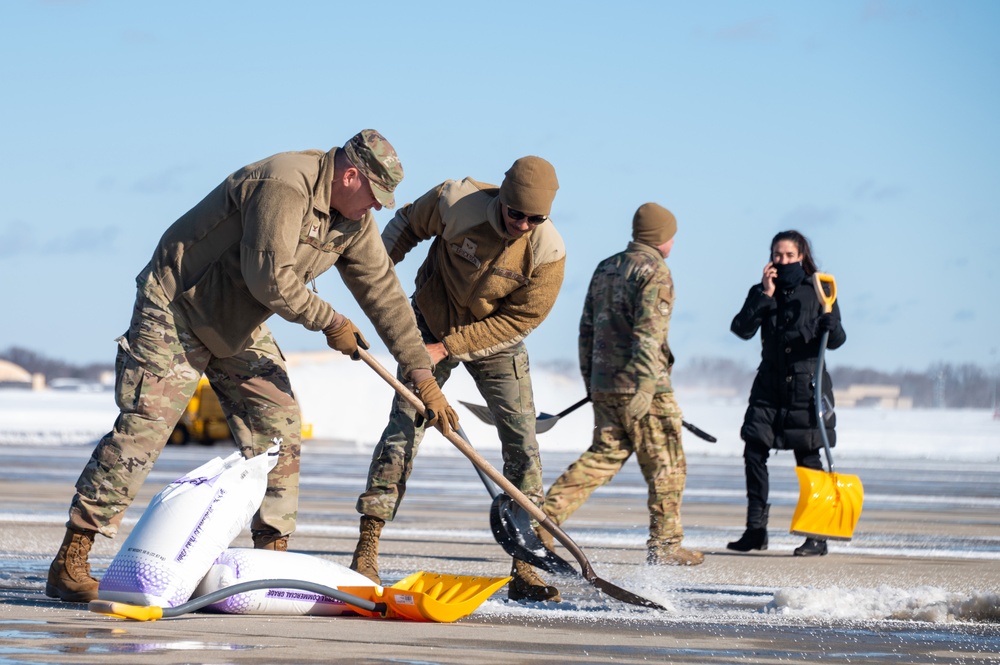 Joint Base Andrews team clears ice, snow ahead of state funeral arrival ceremony