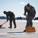 Joint Base Andrews team clears ice, snow ahead of state funeral arrival ceremony