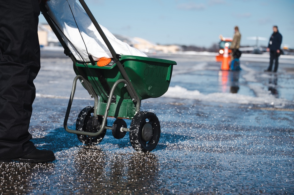 Joint Base Andrews team clears ice, snow ahead of state funeral arrival ceremony