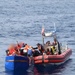 Coast Guard repatriates 20 migrants, 2 dogs to Cuba