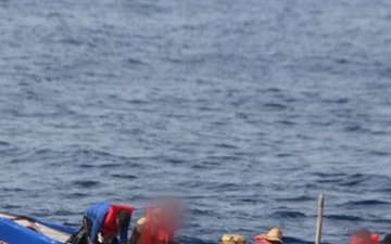 Coast Guard repatriates 20 migrants, 2 dogs to Cuba