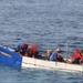 Coast Guard repatriates 20 migrants, 2 dogs to Cuba