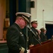 U.S. Navy Cmdr. Chance Smith addresses the crowd during a change of command ceremony for USS Truxtun (DDG 103)