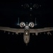 A-10 Thunderbolt II aircraft refuel with KC-135 Stratotanker at night