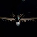 A-10 Thunderbolt II aircraft refuel with KC-135 Stratotanker at night