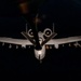 A-10 Thunderbolt II aircraft refuel with KC-135 Stratotanker at night