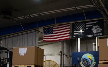 The 305th Aerial Port Squadron palletize food rations to the U.S. European Command area of operations