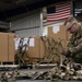 The 305th Aerial Port Squadron palletize food rations to the U.S. European Command area of operations