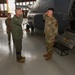 Maj. Gen. Gregory Kreuder, 19th Air Force Commander, is saluted by Airman 1st Class Josue Quezada, 58th Special Operations Wing avionics apprentice, after he received a coin from Maj. Gen. Kreuder