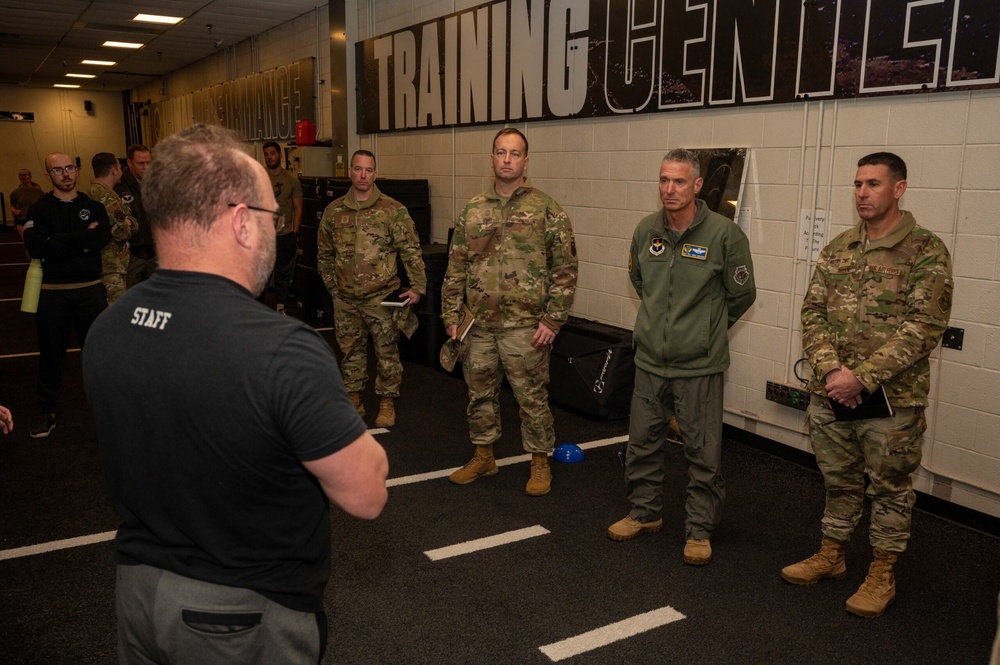 Maj. Gen. Gregory Kreuder, 19th Air Force Commander, is briefed by Justin Schwind, human performance advisor at the Human Performance and Leadership Center