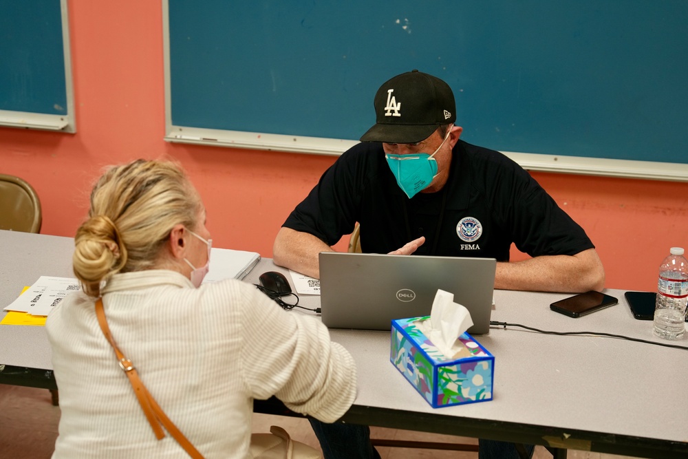 FEMA Staff Help People Apply for Assistance